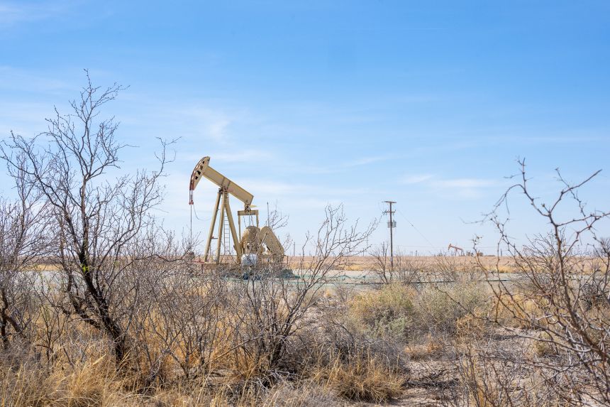 jack pump in the field on March 18, 2026 in Barstow, Texas. Oil prices have risen as recent conflicts involving Iran, the United States, and Israeli forces have increased global concerns about energy costs.